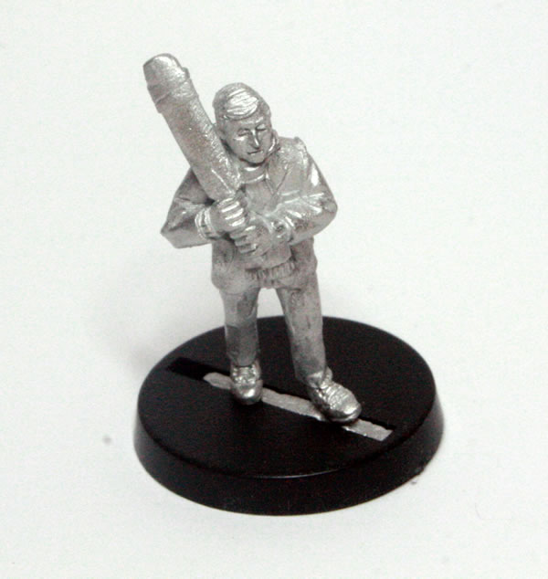 Frank Pike stands ready to face the enemy with a cricket bat.
