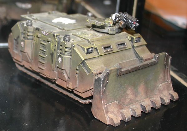 Space Marine Rhino with Forgeworld Dozer Blade, from the Forgeworld display cabinets. 