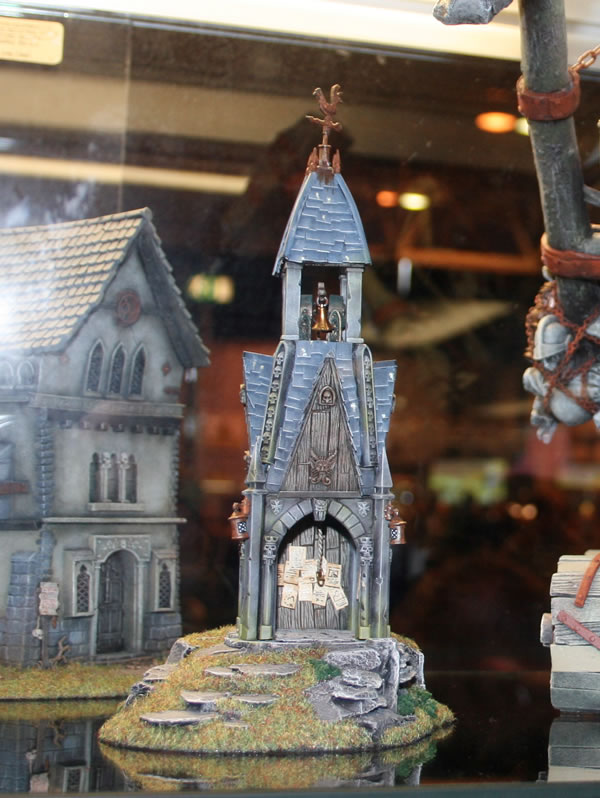 Though from a Warhammer Historical game at GamesDay 2007, this hamlet would not look out of place in a game of Warhammer Fantasy Battle.