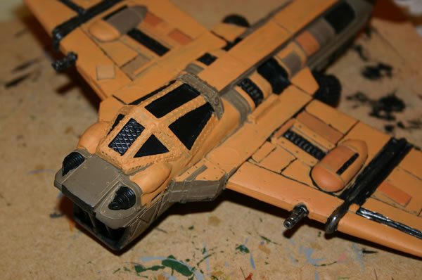 This is a photograph with more work done on the cockpit area. It will then be given an ink/paint wash, drybrushed and highlighted. 