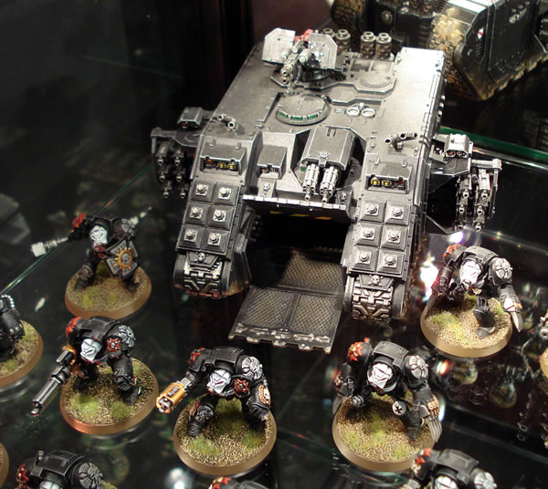 Black Templars Terminators disembark from their Land Raider Crusader, on display at Warhammer World. 